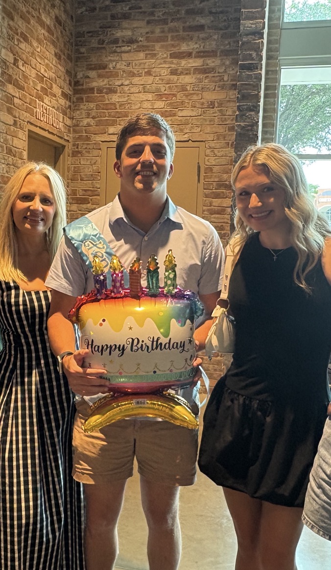 Birthday celebration with a happy birthday cake balloon