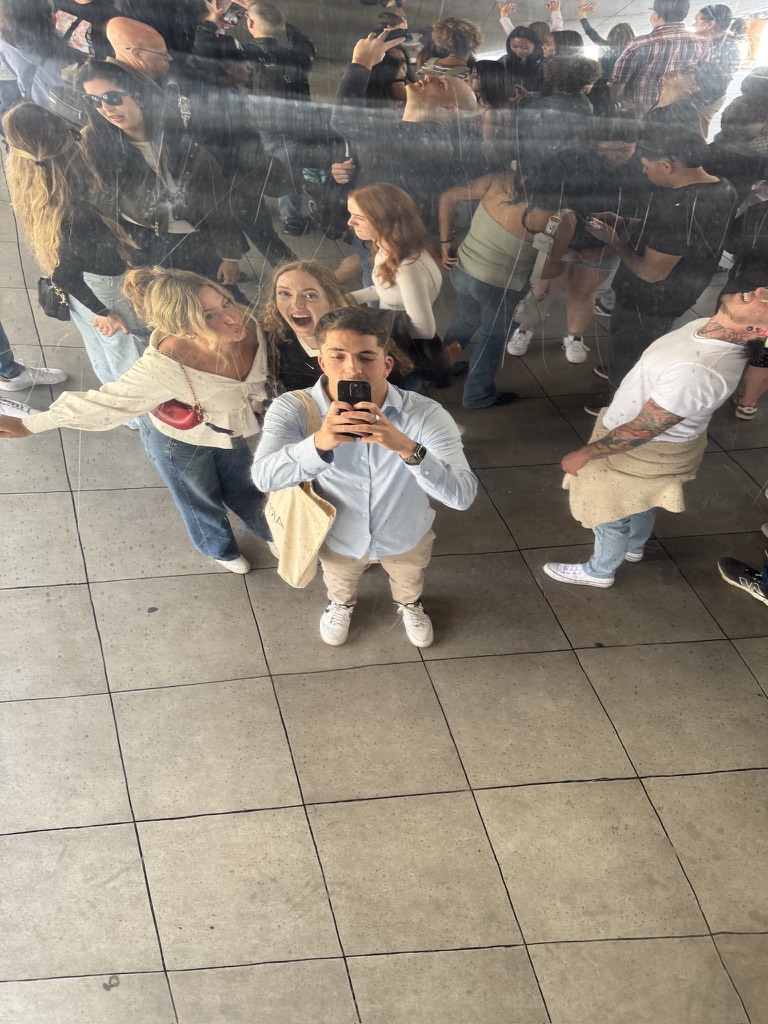 Group reflection selfie in the Chicago Bean