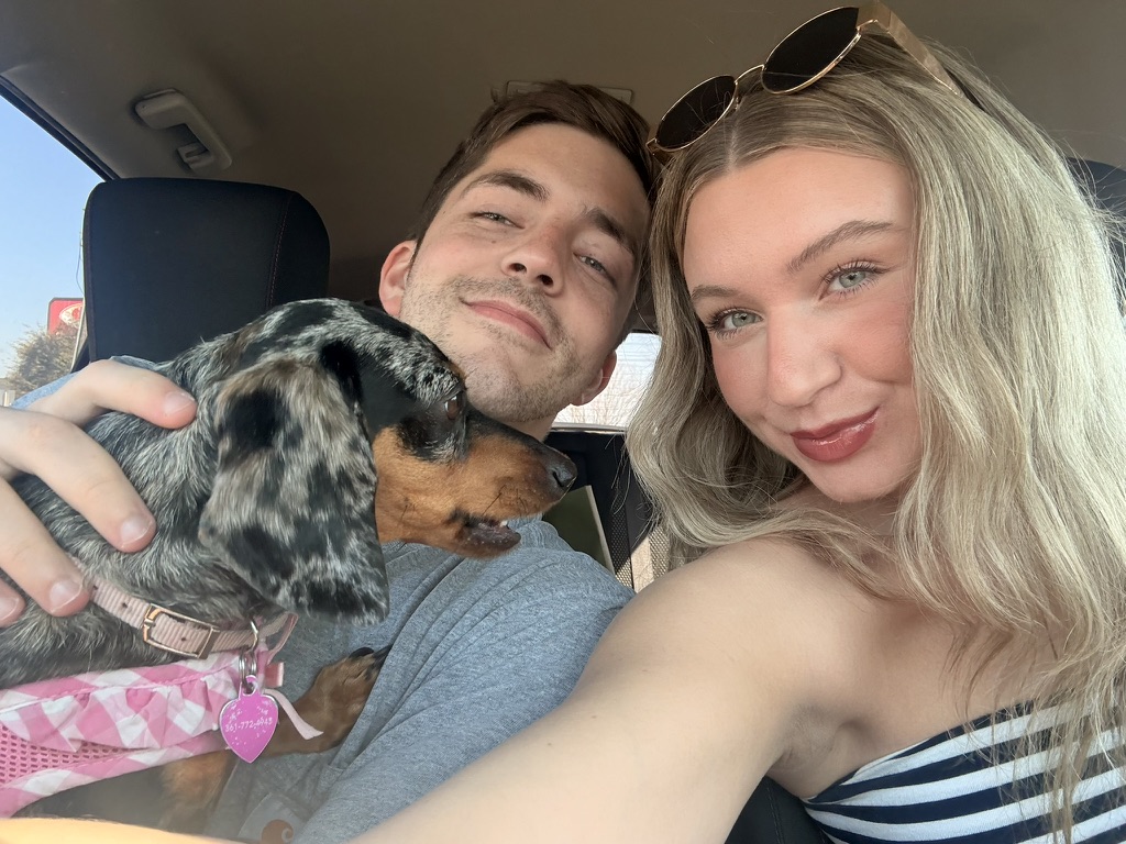 Macie, Kenny and Coco in a car selfie